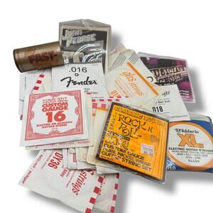 x55 various guitar strings Ernie Ball, Fender, D'Addario, and GHS
